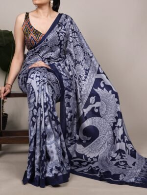 experience the beauty of traditional kalamkari prints on luxurious tasar silk, enhanced with a unique ikkat print blouse for a sophisticated look ynf7301mrn